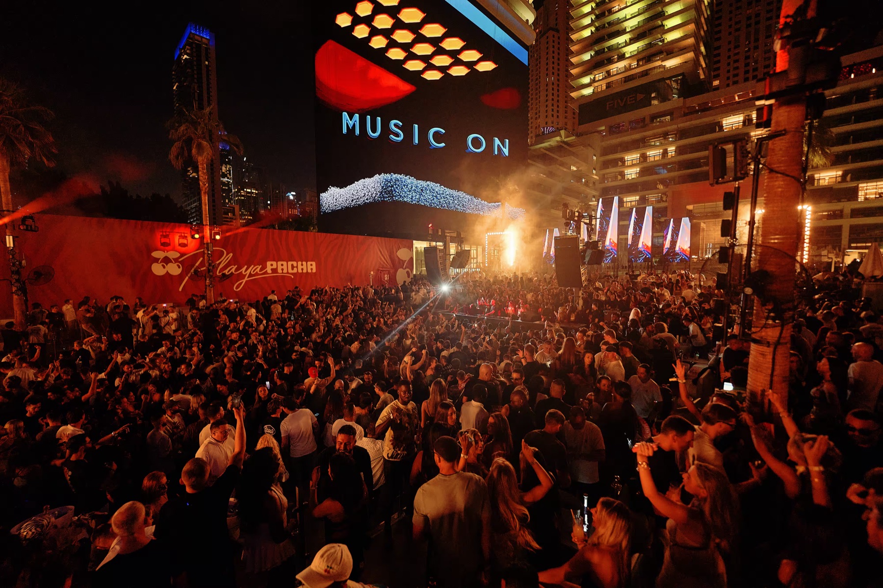 The open-air Pacha ICONS crowd at Playa Pacha, FIVE LUXE JBR